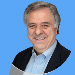 Joseph-Schembri-Head-Shot-blue-background.png